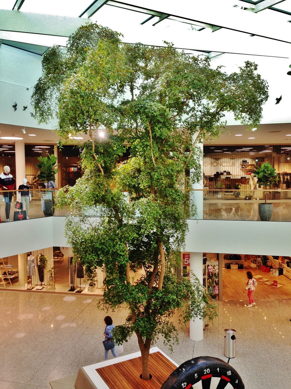 Shopping mall design with plants in Mongolia - iXtenso – retail trends